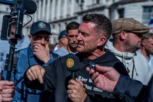 September 26, 2026, London, United Kingdom: Far-right activist Tommy Robinson takes part during a protest against grooming gangs targeting British girls. The event organised by Together For The Children in collaboration with Football Lads on National Survivors Day stands in solidarity with survivors of child sexual abuse and sexual violence while demanding stronger child protections and legal reforms, as well as a curb on illegal migration. London United Kingdom - ZUMAs197 20260926_aaa_s197_309 Copyright: xLabxMox
