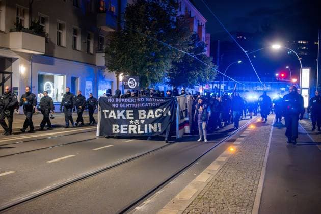 September 26, 2026, Berlin, Germany: BERLIN, GERMANY, SEPTEMBER 26, 2026: Demonstrators march through the Friedrichshain district of Berlin in support of the occupied building known as Hugohaus at GoÂ¼rtelstraoÅ¸e 39, following a police operation that removed the remaining occupants from the property. Around 200 people joined the demonstration, according to the photographer, protesting the police action and calling for the preservation of the occupied building. Police later dispersed the demonstration and detained one person. Berlin Germany - ZUMAq101 20260926_zna_q101_254 Copyright: xJessxFlomx