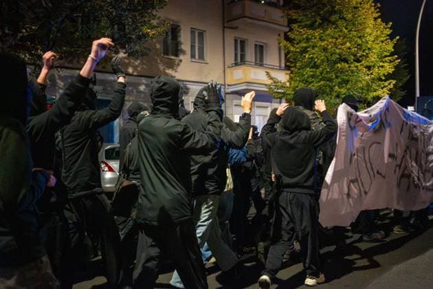 September 26, 2026, Berlin, Germany: BERLIN, GERMANY, SEPTEMBER 26, 2026: Demonstrators march through the Friedrichshain district of Berlin in support of the occupied building known as Hugohaus at GoÂ¼rtelstraoÅ¸e 39, following a police operation that removed the remaining occupants from the property. Around 200 people joined the demonstration, according to the photographer, protesting the police action and calling for the preservation of the occupied building. Police later dispersed the demonstration and detained one person. Berlin Germany - ZUMAq101 20260926_zna_q101_257 Copyright: xJessxFlomx