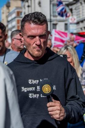 September 26, 2026, London, United Kingdom: Far-right activist Tommy Robinson takes part during a protest against grooming gangs targeting British girls. The event organised by Together For The Children in collaboration with Football Lads on National Survivors Day stands in solidarity with survivors of child sexual abuse and sexual violence while demanding stronger child protections and legal reforms, as well as a curb on illegal migration. London United Kingdom - ZUMAs197 20260926_aaa_s197_301 Copyright: xLabxMox