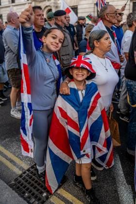 September 26, 2026, London, United Kingdom: Young protestors take part in a protest against grooming gangs targeting British girls. The event organised by Together For The Children in collaboration with Football Lads on National Survivors Day stands in solidarity with survivors of child sexual abuse and sexual violence while demanding stronger child protections and legal reforms, as well as a curb on illegal migration. London United Kingdom - ZUMAs197 20260926_aaa_s197_298 Copyright: xLabxMox