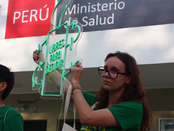 September 26, 2026, Lima, Lima, Peru: Free to decide reads the illuminated Amnesty International sign facing the Ministry of Health when on International Safe Abortion Day hundreds of women, wearing green scarf, carry out a demonstration demanding legal, safe, and free abortion in Peru, as part of the comprehensive health of girls, adolescents, women, and anyone with the possibility of gestating. Abortion in Peru, a conservative country, is illegal and punishable Lima Peru - ZUMAg240 20260926_zip_g240_025 Copyright: xCarlosxGarciaxGranthonx