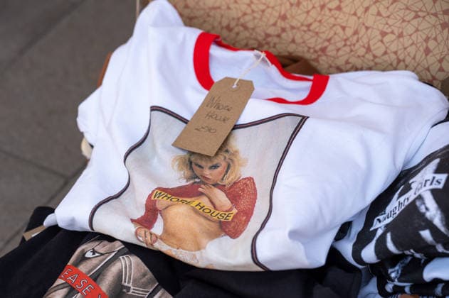 September 26, 2026, London, United Kingdom: A T-shirt on sale seen at the King™s Cross Classic Car Boot Sale in London. The Kings Cross Classic Car Boot Sale returned to Granary Square and Stable Street, King™s Cross, London, for its 11th year. Held several times throughout the year, the event brings together vintage fashion, second-hand clothing, jewellery, homewares, collectables and vinyl records alongside classic cars, motorcycles and commercial vehicles. Visitors browsed stalls and traders, with many making a special effort to dress in period clothing inspired by the 1950s, 1960s and 1970s.continuing a tradition associated with the event. London United Kingdom - ZUMAs197 20260926_aaa_s197_381 Copyright: xJamesxWilloughbyx