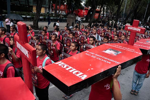 September 26, 2026, Mexico City, Cdmx, Mexico: Parents and relatives of the 43 students from the Raoºl Isidro Burgos Rural Teachers College in Ayotzinapa, Guerrero, marched to mark the 12th anniversary of their forced disappearanceâ€carried out by organized crime in collusion with local police and military forces between September 26 and 27, 2014. Hundreds of students from Ayotzinapa marched alongside activists and the parents of the missing students to demand clarity on the case, as the government has yet to provide precise information regarding the fate of the 43. The demonstration proceeded peacefully from the Angel of Independence monument to the city s Zo³calo; there, on a stage set up in front of the National Palace, the - ZUMAp204 20260926_zip_p204_042 Copyright: xJosuexPerezx