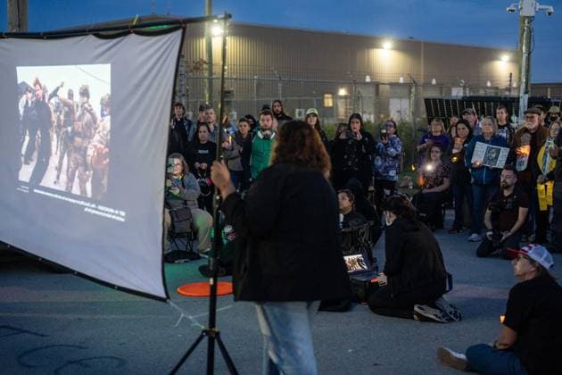 September 26, 2026, Broadview, Illinois, USA: Activists and Media outside the Broadview ICE Facility watch a slideshow of images from Operation Midway Blitz in Chicagoland last year, during a vigil to commemorate the anniversary Broadview USA - ZUMAr170 20260926_znp_r170_022 Copyright: xChrisxRihax