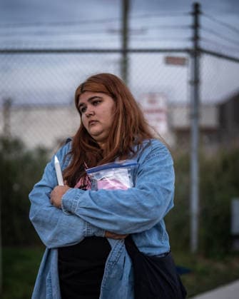 September 26, 2026, Broadview, Illinois, USA: An activist listens to speeches during a candlelight vigil outside the Broadview ICE Facility in Chicagoland, one year after Operation Midway Blitz Broadview USA - ZUMAr170 20260926_znp_r170_015 Copyright: xChrisxRihax