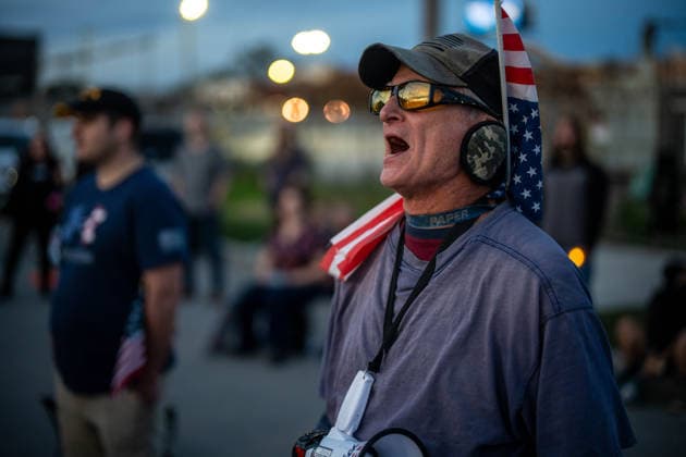 September 26, 2026, Broadview, Illinois, USA: An activist outside the ICE Detention Facility in Broadview, shouting during a speech given at a vigil to mark the one year anniversary of Operation Midway Blitz Broadview USA - ZUMAr170 20260926_znp_r170_017 Copyright: xChrisxRihax