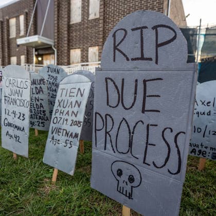 September 26, 2026, Broadview, Illinois, USA: One year after Midway Blitz, cardboard gravestones planted in the lawn outside the ICE Detention Facility in Broadview bearing the names of those killed in ICE operations around the country. One reads RIP Due Process Broadview USA - ZUMAr170 20260926_znp_r170_010 Copyright: xChrisxRihax