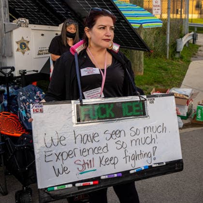 September 26, 2026, Broadview, Illinois, USA: Outside of the ICE Detention Center in Broadview, an activist holds a sign that reads We have seen so much. Experienced so much. We still keep fighting during a vigil, held one year after Operation Midway Blitz in Chicagoland Broadview USA - ZUMAr170 20260926_znp_r170_006 Copyright: xChrisxRihax