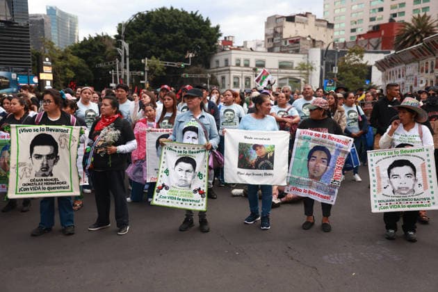 Mexico marks 12 years since disappearance of 43 Ayotzinapa students MEXICO CITY, MEXICO - SEPTEMBER 26: Relatives of the 43 missing students from Ayotzinapa hold images of their loved ones during a rally to mark 12 years since the disappearance of the students in Guerrero state, in Mexico City, Mexico on September 26, 2026. Thousands of people took part in a rally marking 12 years since the disappearance of 43 students from Ayotzinapa, Guerrero state, as the government is set to present an updated report on the investigation on Monday. Daniel Cardenas Anadolu Mexico city Mexico. Editorial use only. Please get in touch for any other usage.  Copyright: x2026xAnadoluxDanielxCardenasx