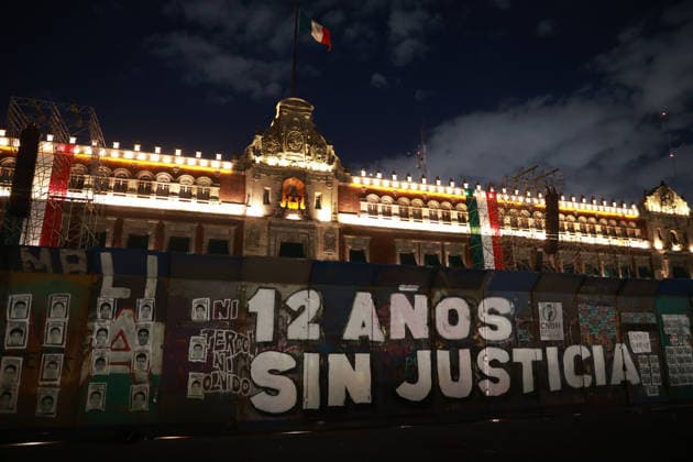 Mexico marks 12 years since disappearance of 43 Ayotzinapa students MEXICO CITY, MEXICO - SEPTEMBER 26: Metal security fences surround the National Palace during a rally to mark 12 years since the disappearance of 43 students from Ayotzinapa, Guerrero state, in Mexico City, Mexico on September 26, 2026. Thousands of people took part in a rally marking 12 years since the disappearance of 43 students from Ayotzinapa, Guerrero state, as the government is set to present an updated report on the investigation on Monday. Daniel Cardenas Anadolu Mexico city Mexico. Editorial use only. Please get in touch for any other usage.  Copyright: x2026xAnadoluxDanielxCardenasx