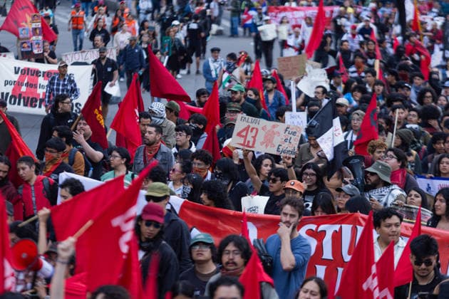 September 26, 2026, Mexico City, Mexico: Families of the 43 students from the Raul Isidro Burgos Rural Teachers College of Ayotzinapa, students and social organizations took part in a march from the Angel of Independence to the Zocalo in Mexico City, marking 12 years since the students disappeared in Iguala, Guerrero. Demonstrators demanded truth and justice. Mexico City Mexico - ZUMAl178 20260926_znp_l178_052 Copyright: xCristianxLeyvax