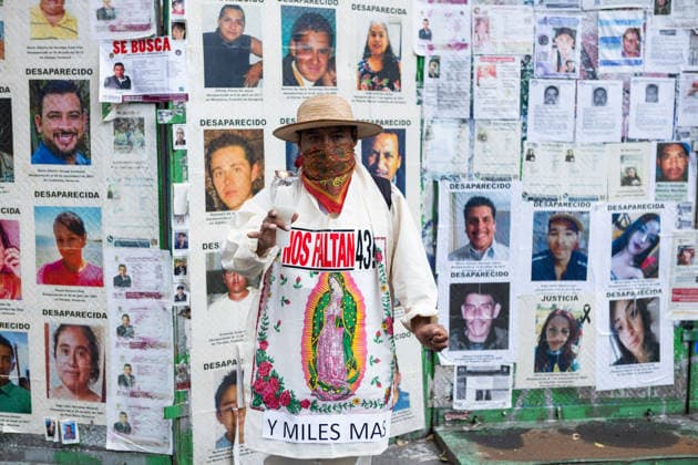 September 26, 2026, Mexico City, Mexico: Families of the 43 students from the Raul Isidro Burgos Rural Teachers College of Ayotzinapa, students and social organizations took part in a march from the Angel of Independence to the Zocalo in Mexico City, marking 12 years since the students disappeared in Iguala, Guerrero. Demonstrators demanded truth and justice. Mexico City Mexico - ZUMAl178 20260926_znp_l178_017 Copyright: xCristianxLeyvax
