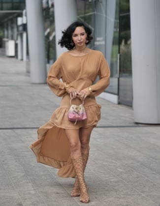 IPA89023517 - Milan, Milan Women s Fashion Week: Spring Summer 2026 2027 - Women s Fashion, Spring Summer 2026–2027 - Ermanno Scervinoi fashion show - Pictured: Guest  Copyright: xLucaxPontix xLucaPonti IpaAgencyx IPA89023517