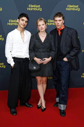 Andronikos Korakas, Jella Haase, and Joshua Hupfauer at the premiere of the feature film *Kinder der Sonne* (*Children of the Sun*) at the 34th Filmfest Hamburg 2026 at Cinemaxx Dammtor in Hamburg, September 26, 2026 Foto:xC.xTamckex xFuturexImagex kinder_6916