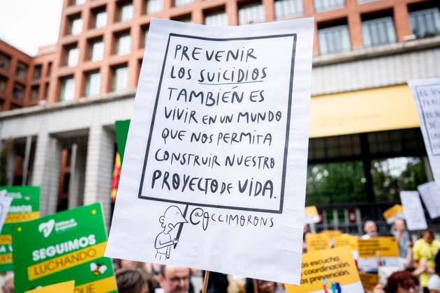 Suicide Prevention Rally in Madrid: Numerous people hold a banner reading Preventing suicide also means living in a world that allows us to build our life plans during the National Rally for Suicide Prevention, in front of the Ministry of Health on September 27, 2026, in Madrid, Spain. The rally was organized under the slogan Active Listening, Collective Response, coinciding with Suicide Awareness Month. SEPTEMBER 27, 2026, On Foot, Madrid, Madrid, Spain  Copyright: xA.xPÃ rezxMecax 7803968
