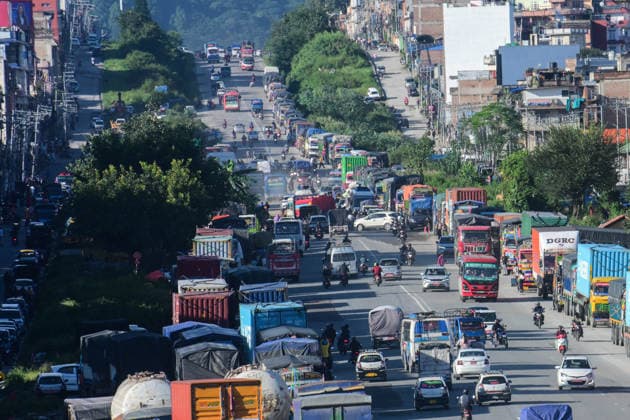 September 27, 2026, Kathmandu, Bagmati, Nepal: Transportation vehicles remain stranded along the Ring Road at Kalanki, a major gateway from Kathmandu toward Naubise and Naagdhunga, in Kathmandu, Nepal, on September 27, 2026, as the Prithvi Highway and other major road routes connecting Kathmandu with different parts of the country remain disrupted by landslides and flooding following several days of continuous heavy rainfall. Persistent rain since September 24 has triggered landslides, road erosion and flooding at multiple locations, repeatedly blocking sections of the Prithvi Highway and leaving hundreds of vehicles and passengers stranded...The prolonged disruption has caused significant difficulties for long-distance drivers and passenge - ZUMAs330 20260927_zsp_s330_007 Copyright: xSafalxPrakashxShresthax