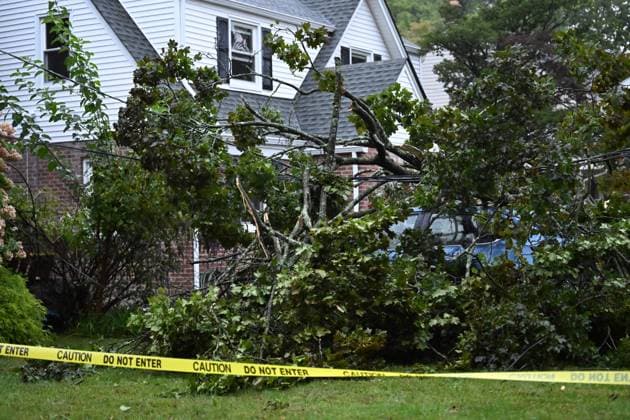 September 27, 2026, Ridgewood, New Jersey, USA: A tree is seen uprooted with wires down outside of a home on Gilbert Street during a nor easter storm in Ridgewood, New Jersey, United States, on Sunday, September 27, 2026. Heavy rain and strong winds battered the northeastern United States as an unusually powerful autumn storm intensified, forcing the cancellation of hundreds of flights and leaving tens of thousands of people without power. New York, Boston and Philadelphia were among the areas affected by the storm, as authorities warned of potential major flooding and road closures. Ridgewood USA - ZUMAs197 20260927_aaa_s197_006 Copyright: xKylexMazzax