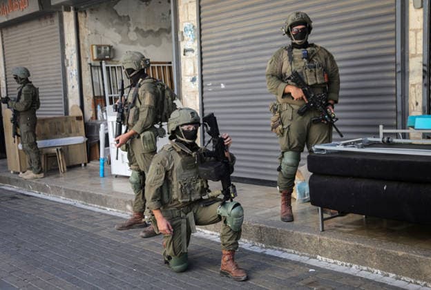 Israeli Soldiers Deploy During Raid in Nablus Old City Israeli soldiers deploy during a raid on the Old City of Nablus, West Bank, on September 27, 2026. Israeli forces entered the city and spread through several areas, including streets leading toward the Old City. Local sources reported searches and arrests, and said 12 students suffered from tear gas inhalation after gas canisters were fired near a school close to the Old City. Photo by Mohammed Nasser apaimages Nablus West Bank Palestinian Territory 270926_Nablus_MN_00(7) Copyright: xapaimagesxMohammedxNasserx xapaimagesx