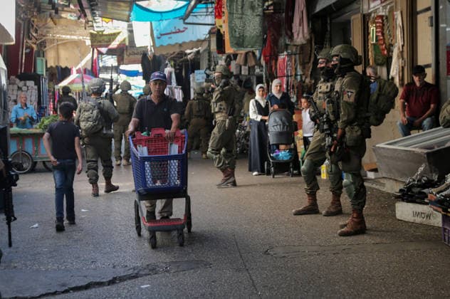 Israeli Soldiers Deploy During Raid in Nablus Old City Israeli soldiers deploy during a raid on the Old City of Nablus, West Bank, on September 27, 2026. Israeli forces entered the city and spread through several areas, including streets leading toward the Old City. Local sources reported searches and arrests, and said 12 students suffered from tear gas inhalation after gas canisters were fired near a school close to the Old City. Photo by Mohammed Nasser apaimages Nablus West Bank Palestinian Territory 270926_Nablus_MN_00(6) Copyright: xapaimagesxMohammedxNasserx xapaimagesx