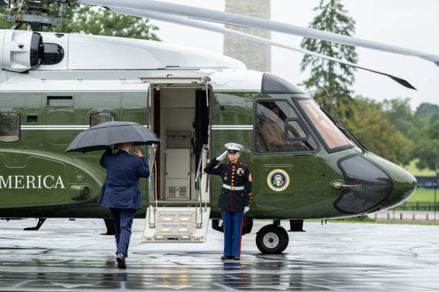September 27, 2026, Washington, District Of Columbia, United States: U.S. President DONALD TRUMP walks across the South Lawn of the White House toward Marine One before departing for Illinois to attend the final round of the Presidents Cup at Medinah Country Club. Washington United States - ZUMAk206 20260927_znp_k206_001 Copyright: xMattxKaminskyx
