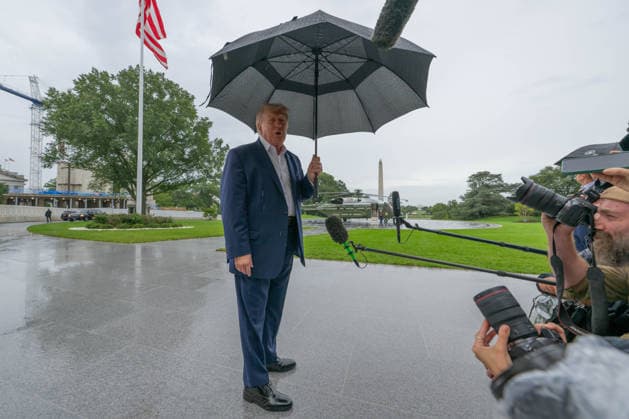 September 27, 2026, Washington, District Of Columbia, United States: U.S. President DONALD TRUMP speaks to members of the press on the South Lawn of the White House before departing for Illinois to attend the final round of the Presidents Cup at Medinah Country Club. Washington United States - ZUMAk206 20260927_znp_k206_006 Copyright: xMattxKaminskyx