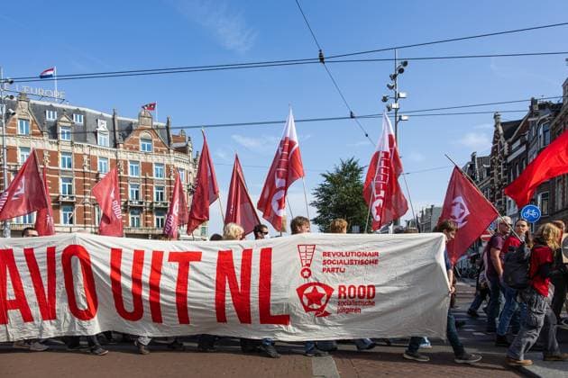 AMSTERDAM Demonstrators participate in the National Peace Protest. The protest on Dam Square and the subsequent march were organized by the Stop War Fever movement, a coalition of progressive organizations concerned about, among other things, rising defense spending. DINGENA MOL ANP netherlands out - belgium out  Copyright: xx x570397611x originalFilename: 570397611.jpg