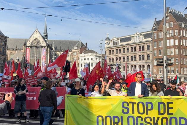 NETHERLANDS, AMSTERDAM - SEPTEMBER 27, 2026: Activists wave flags during a rally against militarisation and for peace with Russia in Dam Square. Natalya Blinova TASS  98429454
