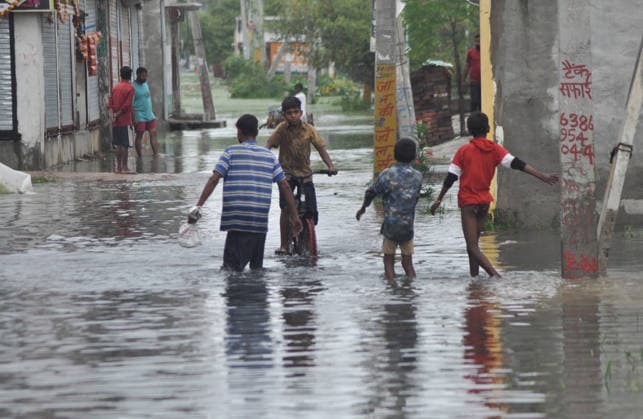 LUCKNOW, INDIA - SEPTEMBER 27: Floodwaters inundated at daud nagar Faizullaganj following two days of continuous rainfall on September 27, 2026 in Lucknow, India. According to the India Meteorological Department forecast, weather conditions are likely to remain affected in the state on Saturday and Sunday. In eastern Uttar Pradesh, a warning of very heavy rainfall has been issued, along with heavy rainfall, thunder and lightning, and strong winds. (Photo by Deepak Gupta Hindustan Times ) Lucknow: Heavy Rain Triggers Waterlogging, Traffic Disruptions Across City