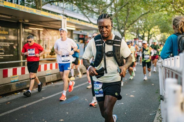 Highlights from the 52nd BMW BERLIN MARATHON on September 27, 2026, in Berlin: Runners on the marathon course and spectators lining the route of the 2026 BMW Berlin Marathon