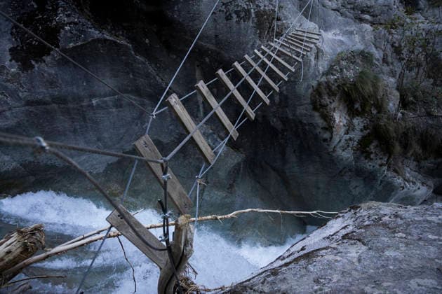 Gyr Flood Damage - France A damaged section of the via ferrata hangs above the turbulent waters of the Gyr. Vallouise-Pelvoux, Hautes-Alpes, France, September 27, 2026. The exceptional floods of August 28 caused major damage in Vallouise-Pelvoux and on the road to Ailefroide. The damage highlights the growing exposure of Alpine valleys to intense rainfall and torrential hazards in a warming climate. Photo by Thibaut Durand ABACAPRESS.COM Vallouise-Pelvoux PROVENCE-ALPES-COTE D AZUR France  Copyright: xDurandxThibaut ABACAx