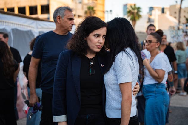 September 27, 2026, Tel Aviv, Tel Aviv, Israel: MK NAAMA LAZIMI of the Democrats embraces EINAV ZANGAUKER, mother of freed hostage Matan Zangauker at a Sukka, a tent for the holiday of Sukkot, built by families of former hostages In Hostages Square to commemorate 3 years since October 7th Tel Aviv Israel - ZUMAg280 20260927_znp_g280_002 Copyright: xYoavxGinsburgx