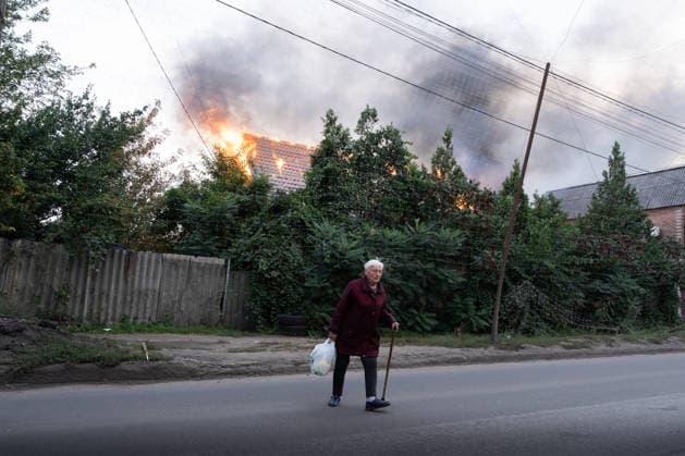 September 27, 2026, Sloviansk, Donetsk Oblast, Ukraine: A local Resident walks past a Russian drone attack on a residential area in the frontline city of Sloviansk, Donetsk Oblast, Ukraine, September 28, 2026. Sloviansk Ukraine - ZUMAm350 20260927_zip_m350_007 Copyright: xCameronxJones-Manleyx