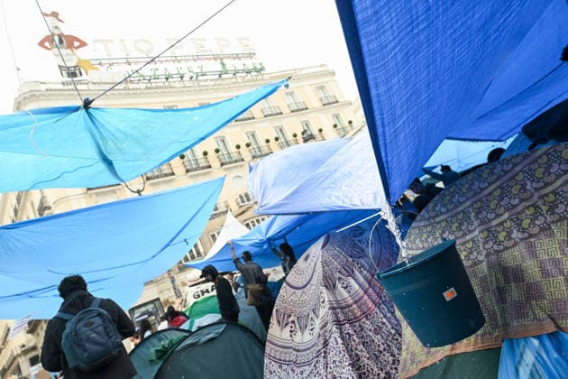 The Puerta del Sol encampment continues despite the rain. Dozens of people remain camped out to protest the housing crisis despite the rain at Puerta del Sol on September 28, 2026, in Madrid, Spain. The rain has forced participants in the encampment for the right to housing to readjust their awnings and tarps, but the Tenants’ Union is maintaining the protest and continues to distribute food among those present. They are calling for a new housing decree dubbed the Maricarmen Decree in honor of the octogenarian who was evicted last Wednesday, September 23, in Madrid, which would provide measures to guarantee the right to housing. SEPTEMBER 28, 2026 Madrid Madrid, Spain  Copyright: xGustavoxValientex 7806422