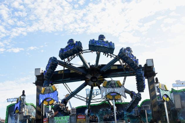 Munich, September 28, 2026, Theresienwiesn, Oktoberfest, carnival operator, Predator ride, visitors, photo, Munich