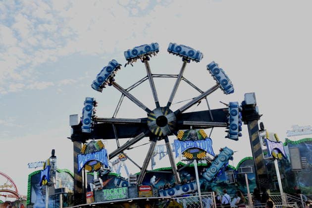 Munich, September 28, 2026, Theresienwiesn, Oktoberfest, carnival operator, Predator ride, visitors, photo, Munich