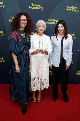 Malika Rabahallah, Helen Mirren, and Iris Berben at the premiere of the film *A Talent for Murder* and the Douglas Sirk Award ceremony at the 34th Filmfest Hamburg at Cinemaxx Dammtor in Hamburg, Germany, September 29, 2026 Foto:xC.xTamckex xFuturexImagex mirren_6943
