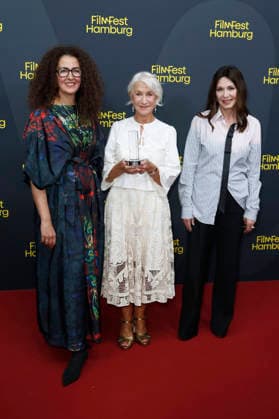 Malika Rabahallah, Helen Mirren, and Iris Berben at the premiere of the film *A Talent for Murder* and the Douglas Sirk Award ceremony at the 34th Filmfest Hamburg at Cinemaxx Dammtor in Hamburg, Germany, September 29, 2026 Foto:xC.xTamckex xFuturexImagex mirren_6945