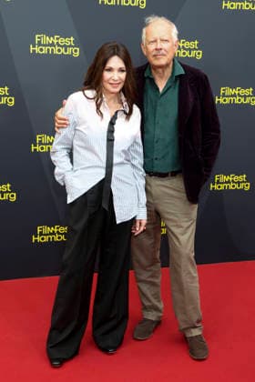 ABB FILMFEST: Iris Berben and Axel Milberg walk the red carpet at the premiere of the film *Die dritte Hochzeit* at FilmFest Hamburg 2026 at the Cinemaxx Dammtor theater in Hamburg on September 29, 2026, Hamburg, Germany