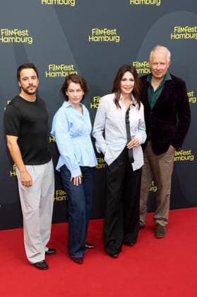 ABB FILMFEST: Kostja Ullmann, Henriette Confurius, Iris Berben, and Axel Milberg walk the red carpet at the premiere of the film *Die dritte Hochzeit* at FilmFest Hamburg 2026 at the Cinemaxx Dammtor theater in Hamburg on September 29, 2026, Hamburg, Germany