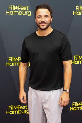 ABB FILMFEST: Kostja Ullmann walks the red carpet at the premiere of the film *The Third Wedding* at FilmFest Hamburg 2026 at the Cinemaxx Dammtor theater in Hamburg on September 29, 2026, Hamburg, Germany