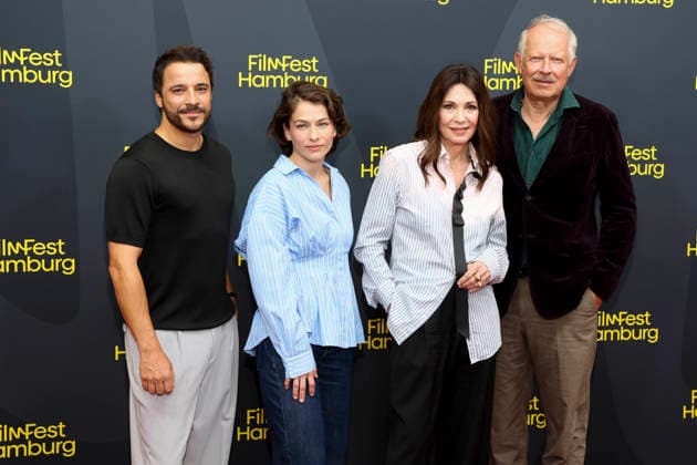 ABB FILMFEST: Kostja Ullmann, Henriette Confurius, Iris Berben, and Axel Milberg walk the red carpet at the premiere of the film *Die dritte Hochzeit* at FilmFest Hamburg 2026 at the Cinemaxx Dammtor theater in Hamburg on September 29, 2026, Hamburg, Germany
