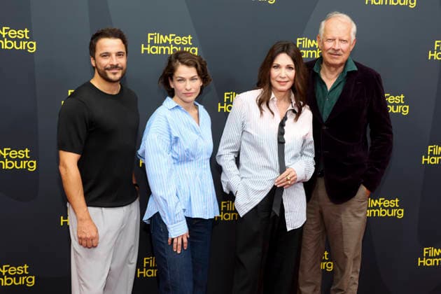 ABB FILMFEST Kostja Ullmann, Henriette Confurius, Iris Berben, and Axel Milberg walk the red carpet at the premiere of the film *The Third Wedding* at FilmFest Hamburg 2026 at the Cinemaxx Dammtor movie theater in Hamburg on September 29, 2026, Hamburg, Germany