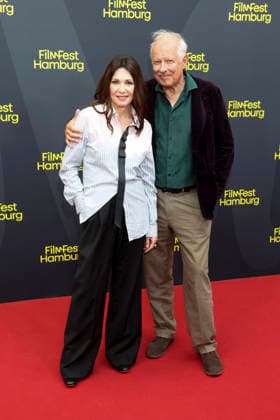 ABB FILMFEST: Iris Berben and Axel Milberg walk the red carpet at the premiere of the film *Die dritte Hochzeit* at FilmFest Hamburg 2026 at the Cinemaxx Dammtor theater in Hamburg on September 29, 2026, Hamburg, Germany
