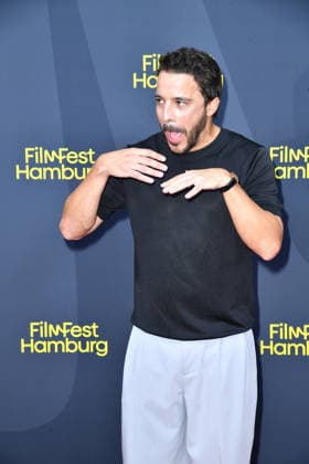 Kostja Ullmann at the FilmFest Hamburg premiere of *The Third Wedding* in Hamburg on September 29, 2026