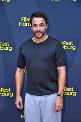 Kostja Ullmann at the FilmFest Hamburg premiere of *The Third Wedding* in Hamburg on September 29, 2026