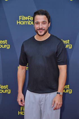 Kostja Ullmann at the FilmFest Hamburg premiere of *The Third Wedding* in Hamburg on September 29, 2026