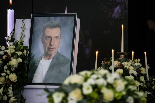 RUSSIA, MOSCOW - SEPTEMBER 30, 2026: A portrait of late Sergei Sosedov, a music critic, is seen during a farewell ceremony at Troyekurovskoye Cemetery. Sosedov died in an accident in the Republic of Sakha (Yakutia) on September 23, at the age of 59 Artyom Geodakyan TASS  98559283