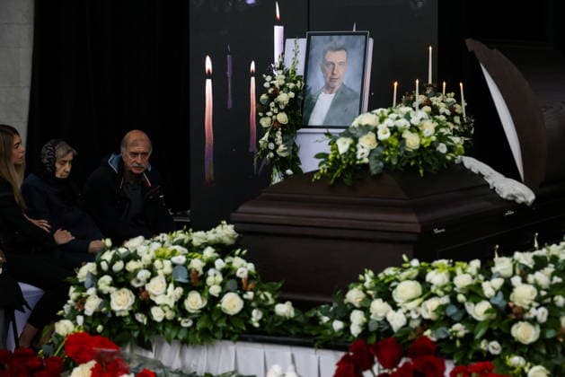 RUSSIA, MOSCOW - SEPTEMBER 30, 2026: A portrait of late Sergei Sosedov, a music critic, is seen during a farewell ceremony at Troyekurovskoye Cemetery. Sosedov died in an accident in the Republic of Sakha (Yakutia) on September 23, at the age of 59 Artyom Geodakyan TASS  98559288