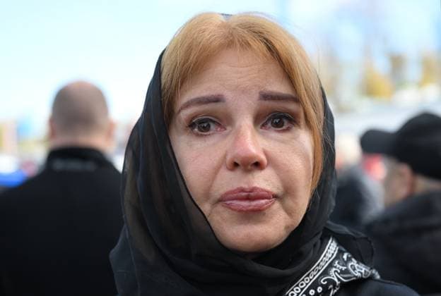Russia Music Critic Sosedov Death 9254373 30.09.2026 Singer Natalia Shturm arrives to attend a farewell ceremony for Russian journalist and music critic Sergey Sosedov, who died at the age of 58 in an accident, at Troyekurovskoye Cemetery in Moscow, Russia. Sosedov died on September 23 from cerebral edema after falling down a staircase in Neryungri, Republic of Sakha, where he had travelled to chair the jury of the Pearl of the Far East fashion and beauty contest. Ekaterina Chesnokova Sputnik Moscow Russia  Copyright: xEkaterinaxChesnokovax